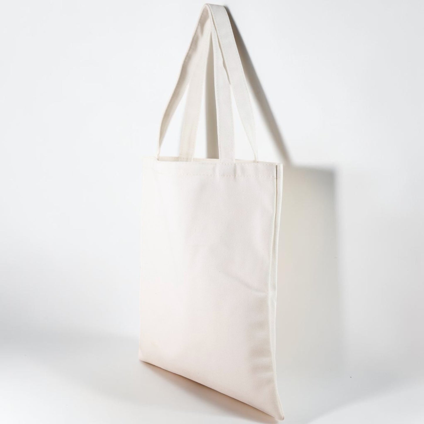 Beige tote bag on a white background