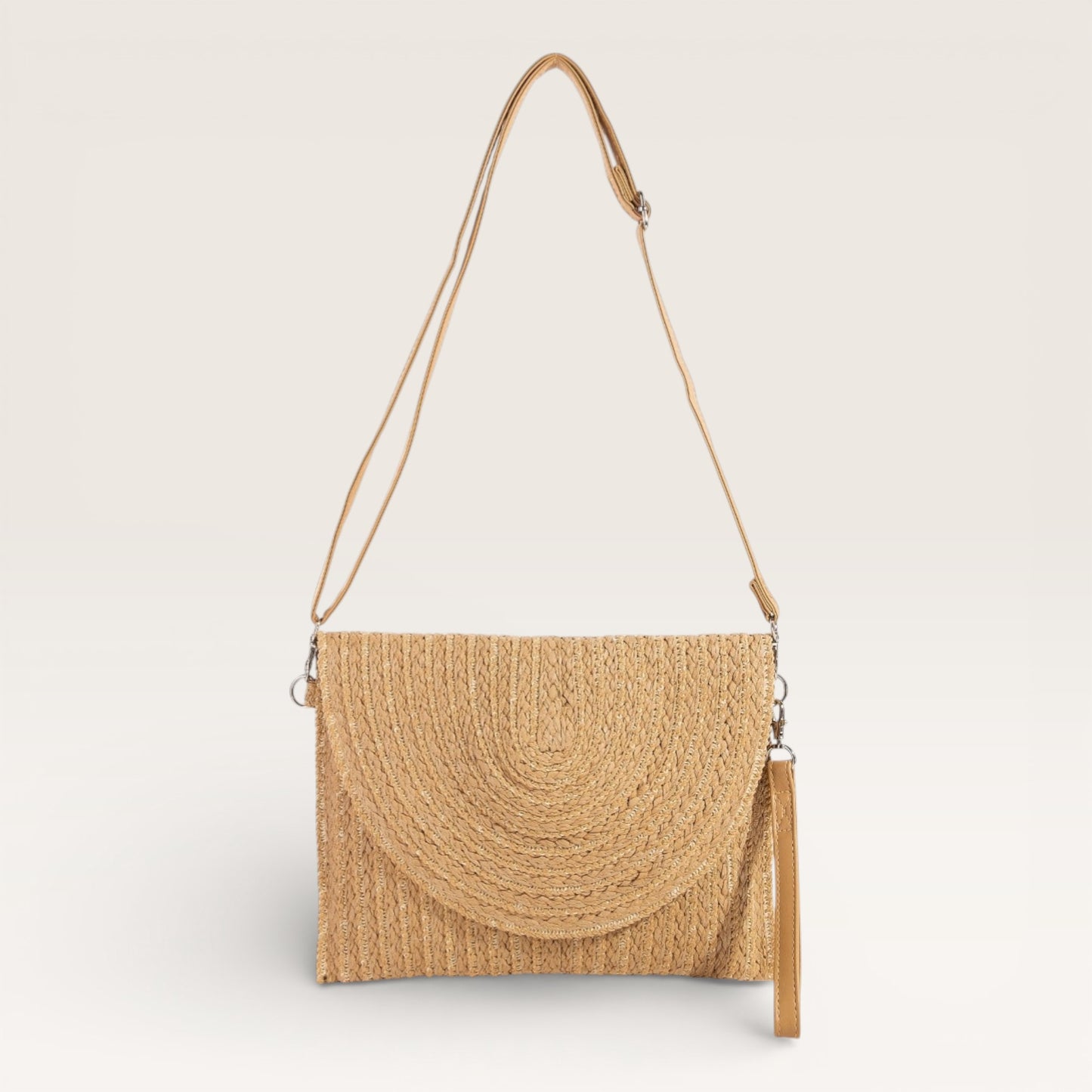 Woven handbag with a strap on a light beige background