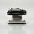 Clear travel case with black lid on a white background