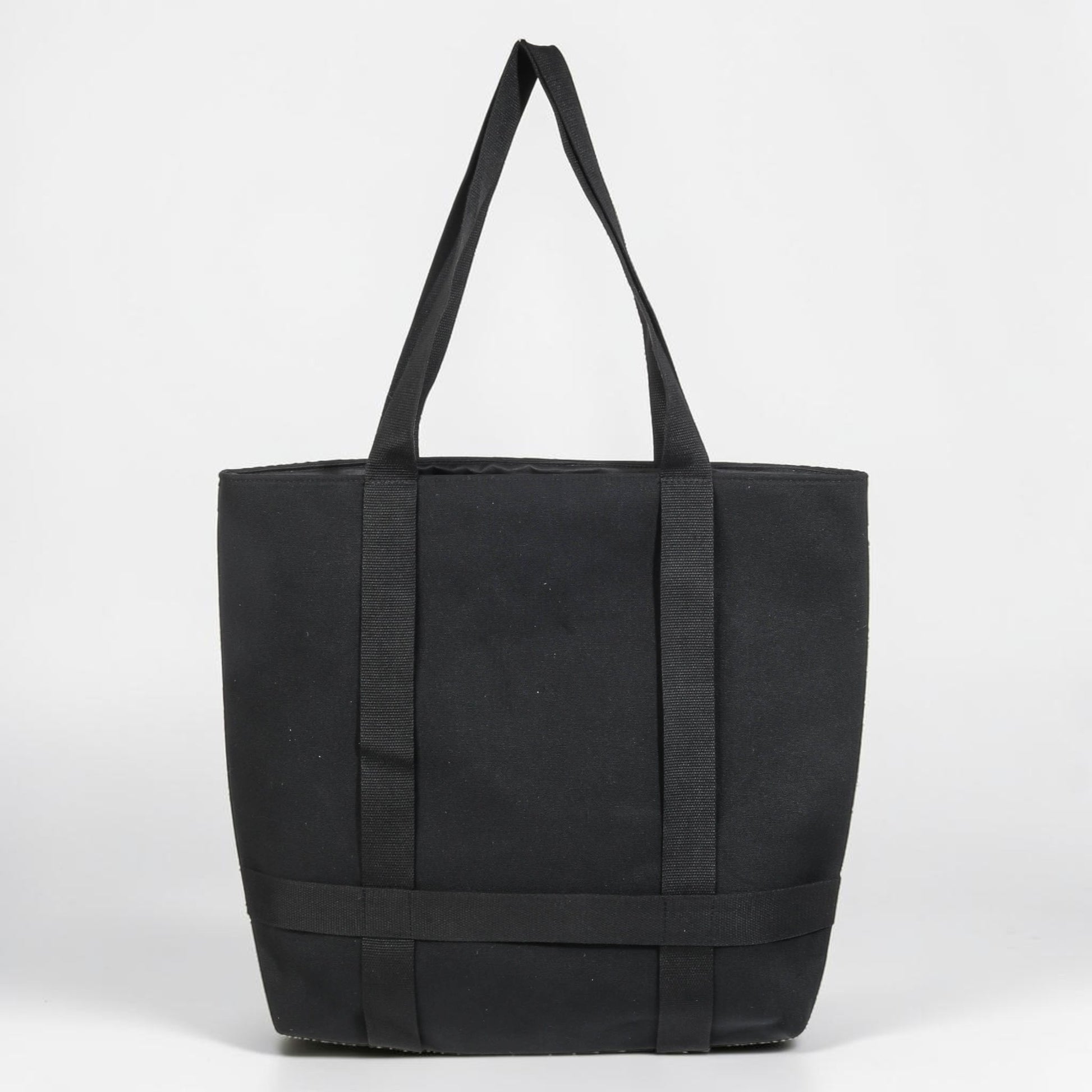 Black tote bag with straps on a white background