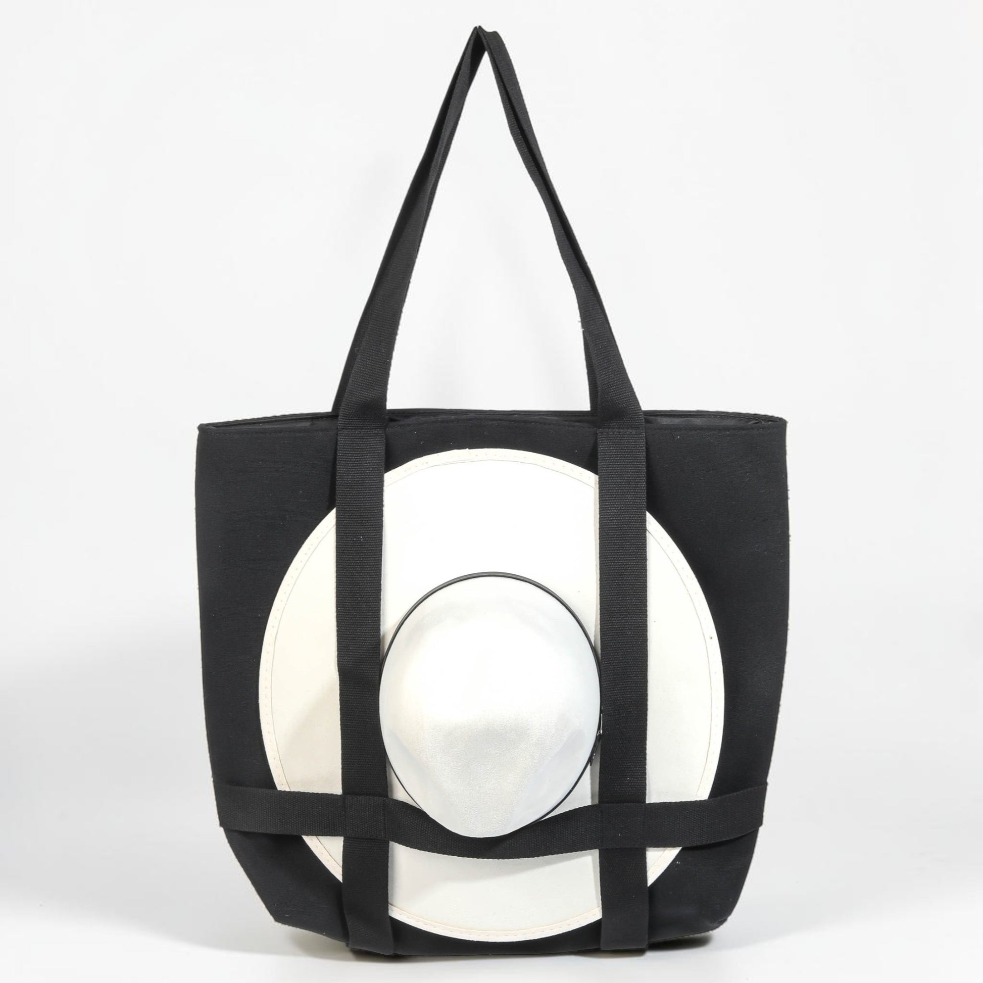 Black tote bag with geometric design on a white background