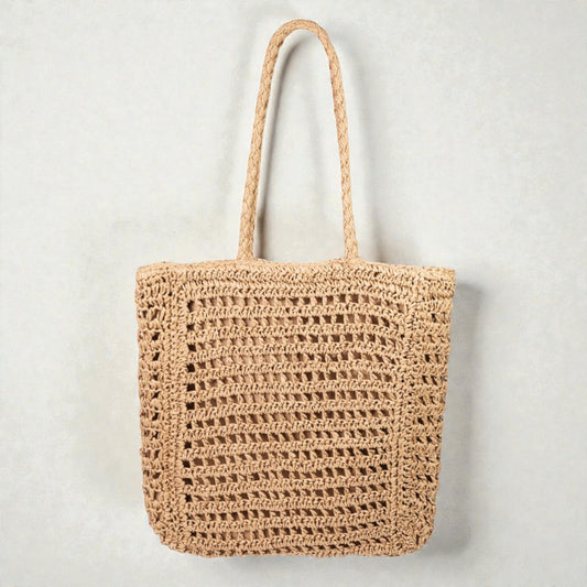Woven beige tote bag on a light gray background