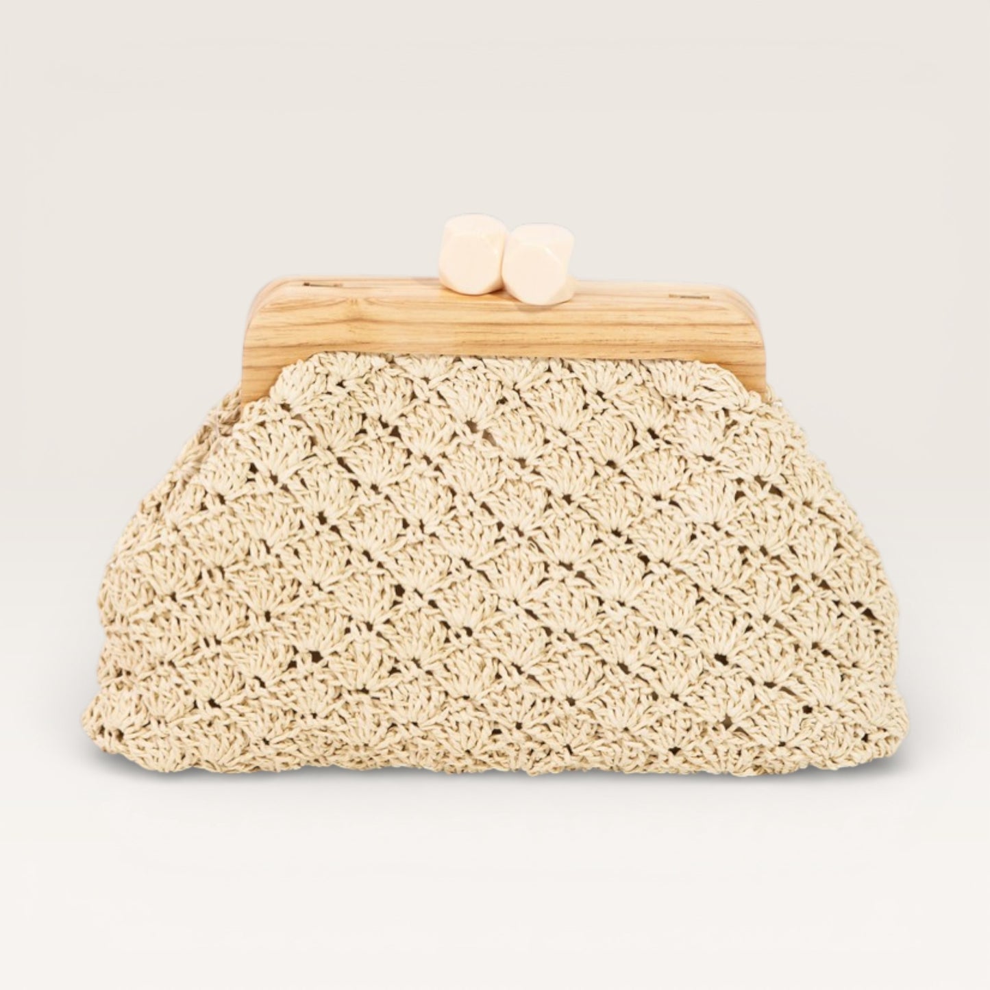 Beige woven clutch bag with wooden clasp on a light gray background