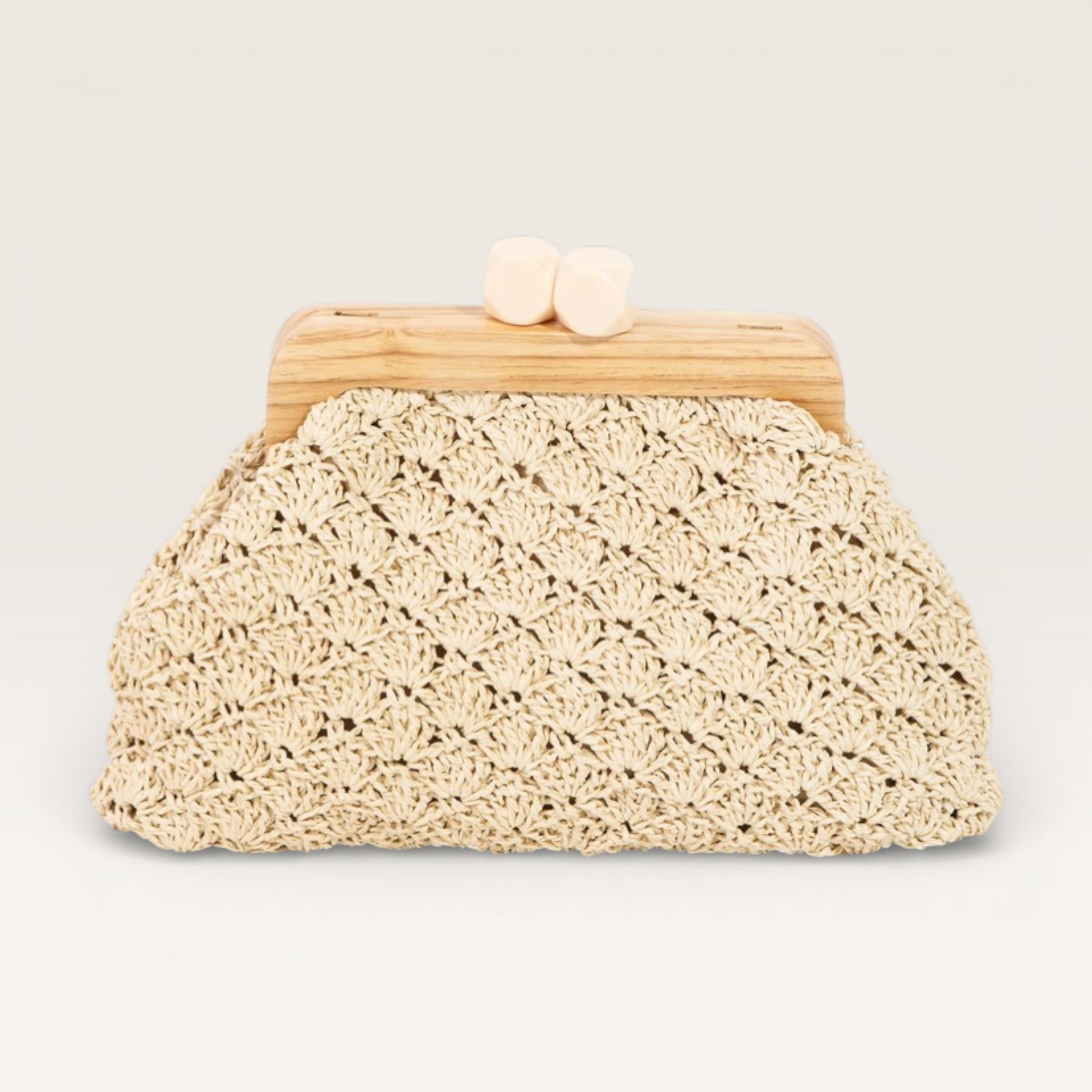Beige woven clutch bag with wooden clasp on a light gray background