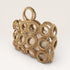 Brown woven basket with circular patterns on a light beige background