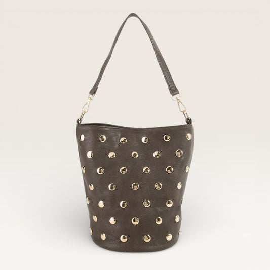 Gray handbag with gold studs on a light gray background