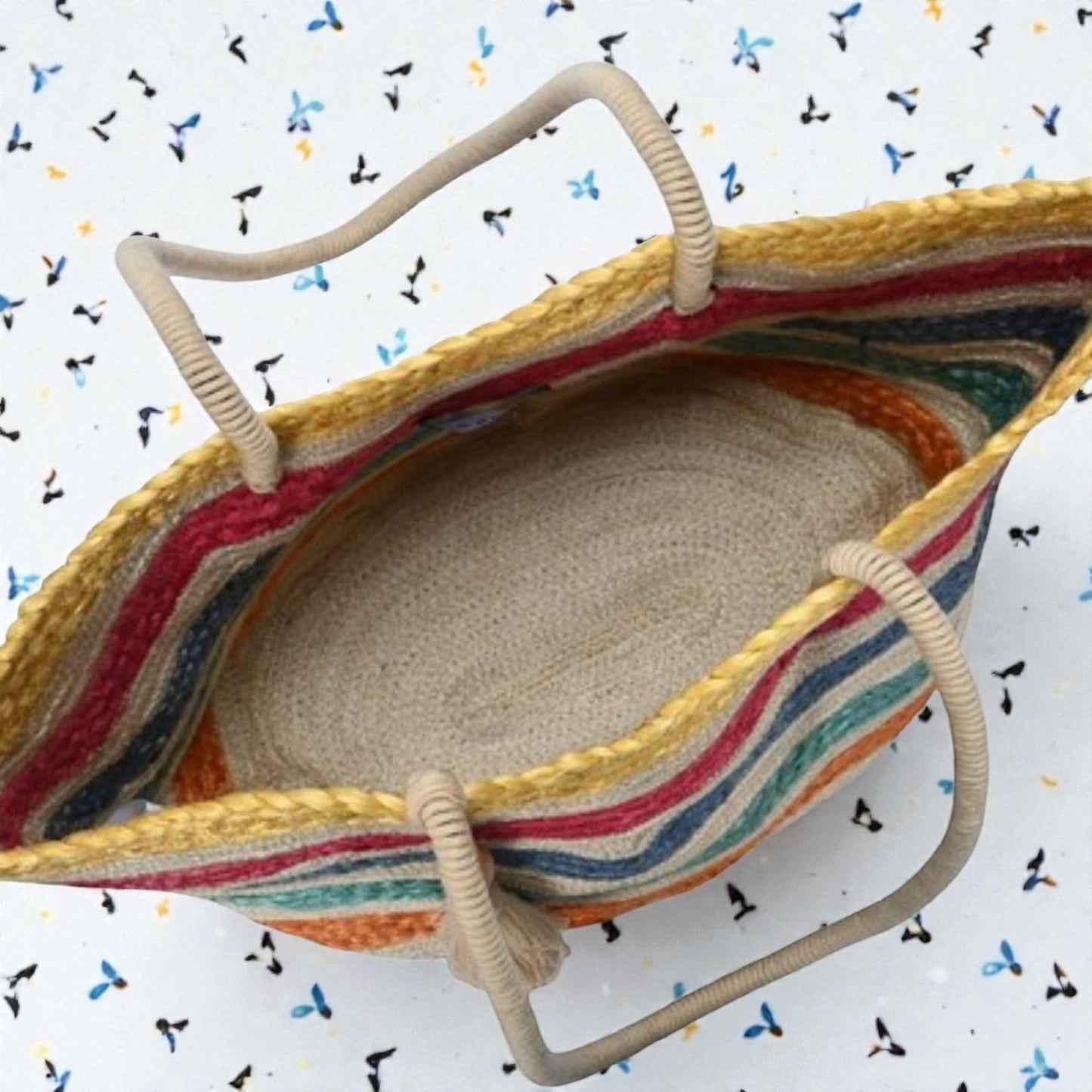 Colorful woven basket with a patterned background