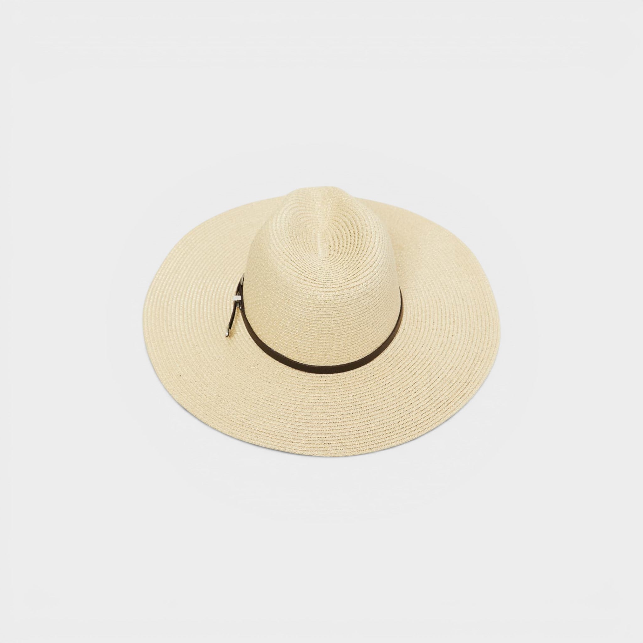 Beige straw hat with black band on a light gray background