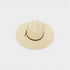 Beige straw hat with black band on a light gray background