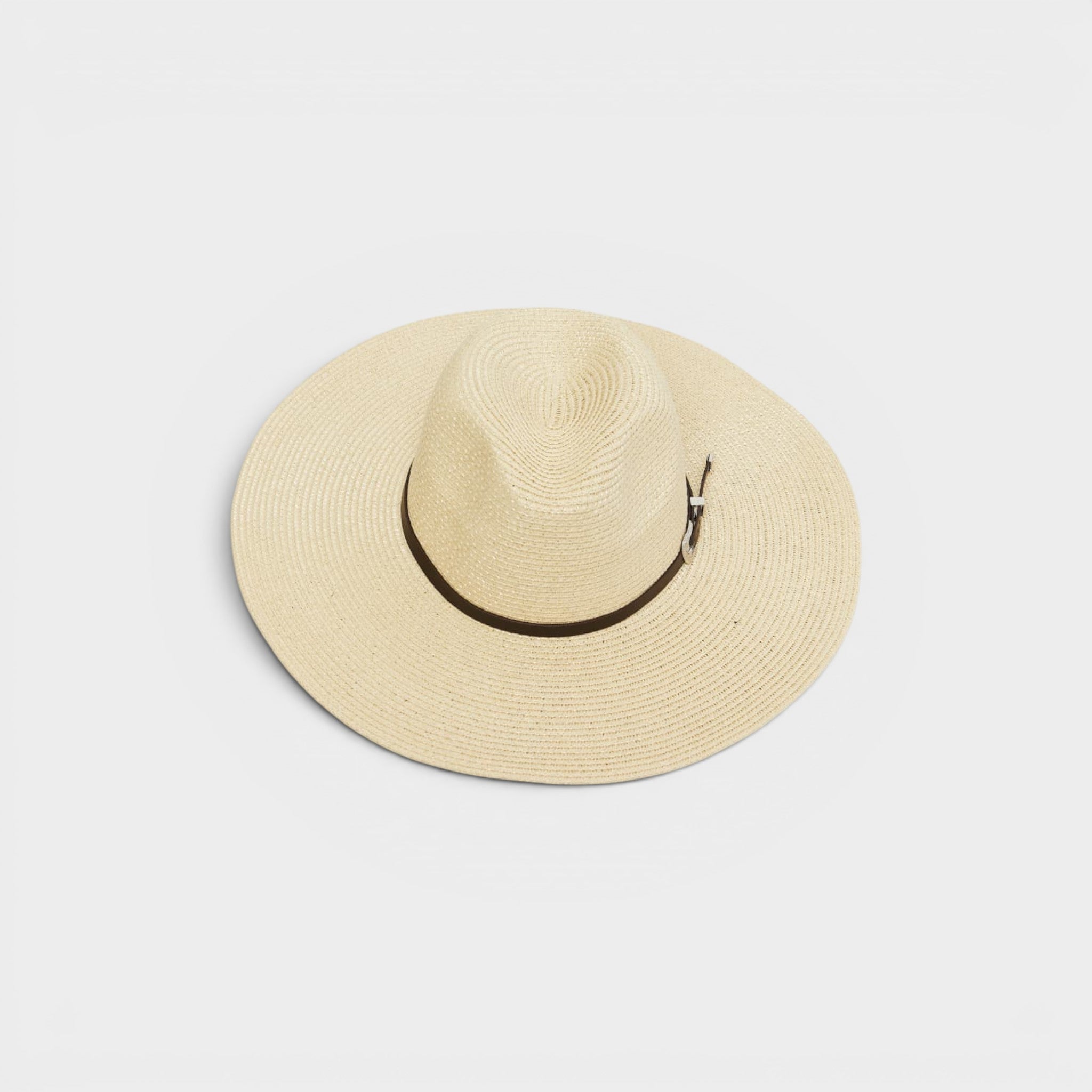 Beige straw hat with a black band on a light gray background