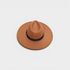 Brown fedora hat with a black band on a light gray background