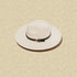 White wide-brimmed hat with a black band featuring a gold triangle on a beige background