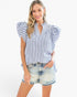 A woman modeling a blue and white vertically striped blouse with ruffled flutter sleeves and a split neckline, paired with light-wash denim shorts against a plain white background.