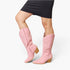 Botas vaqueras hasta la rodilla de cuero vegano en color rosa