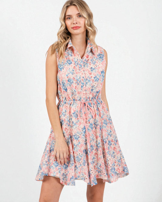 Woman wearing a floral dress on a white background