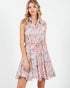 Woman wearing a floral dress on a white background
