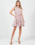 Woman wearing a floral dress on a white background