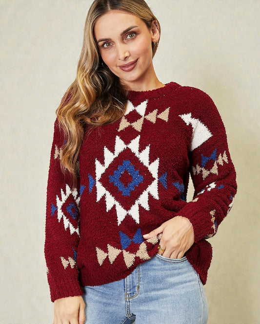Woman wearing a red patterned sweater against a beige background