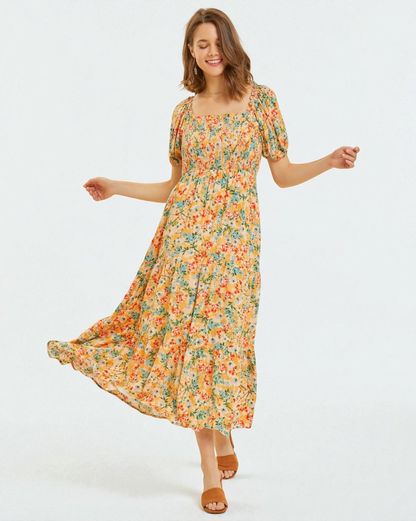 Woman wearing a floral dress on a white background