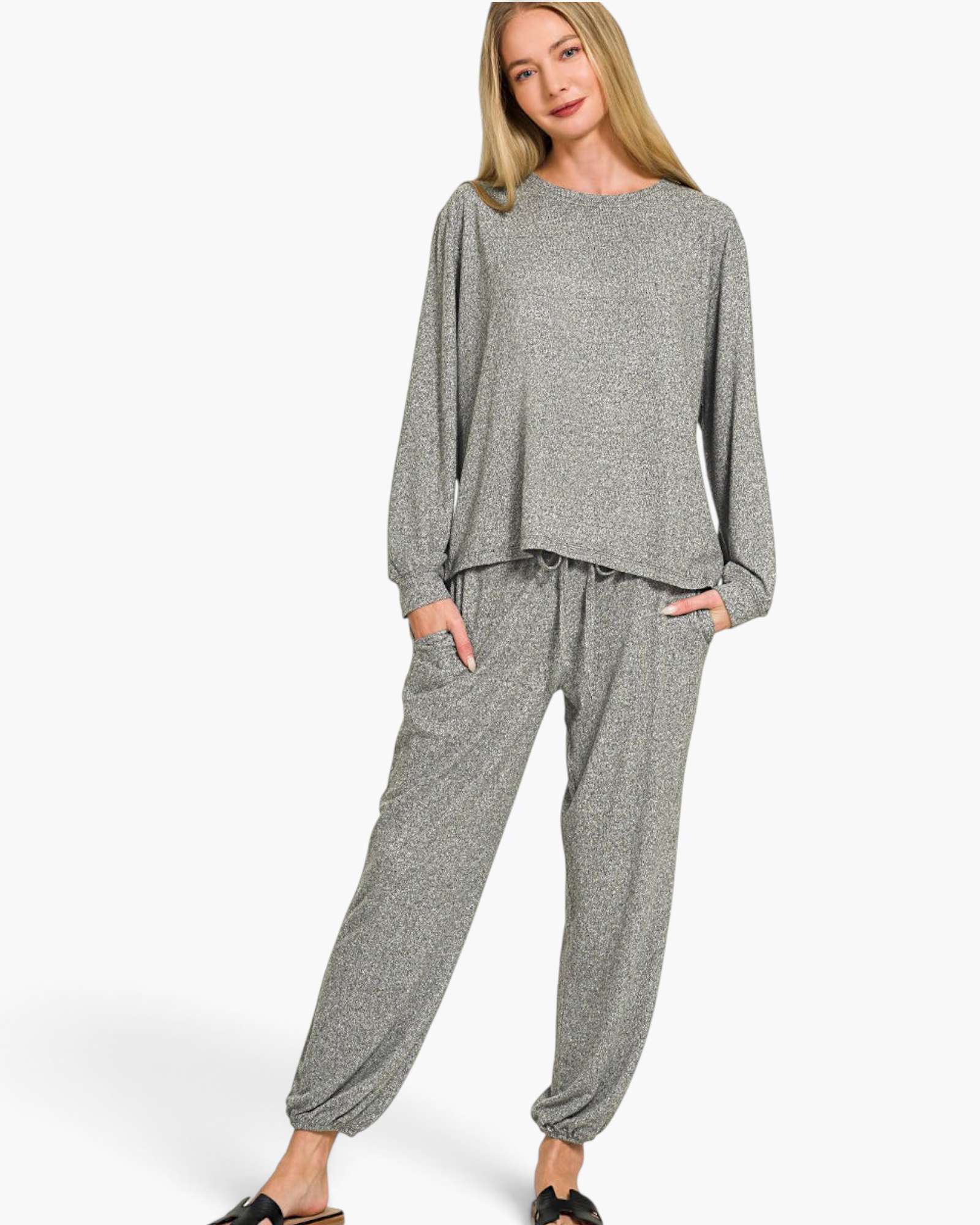 Beach Rose Co. black Hacci knit two-piece lounge set with long-sleeve top and drawstring joggers on a blonde model.