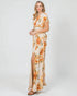 Woman wearing a floral dress with a white background