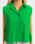 Green sleeveless shirt worn by a person on a white background