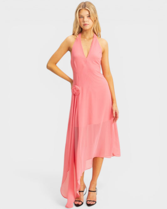 Woman wearing a pink dress on a white background