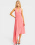 Woman wearing a pink dress on a white background