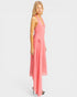 Woman wearing a pink dress on a white background