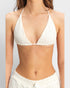 White textured bikini top worn by a person on a plain background