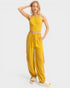Woman wearing a yellow outfit on a white background