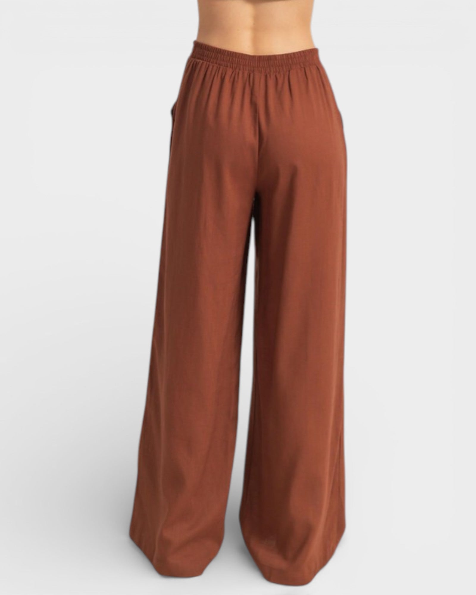 Brown wide-leg pants on a white background