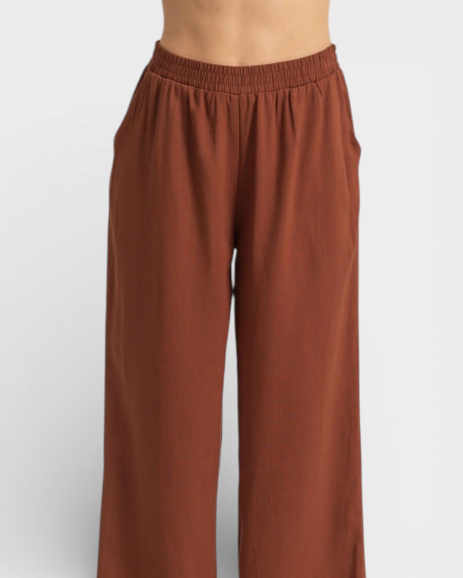 Brown wide-leg pants on a white background