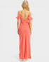 Coral dress with open back on a white background