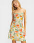 Woman wearing a floral dress on a white background