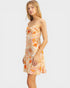 Woman wearing a floral dress on a white background