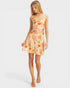 Woman wearing a floral dress on a white background