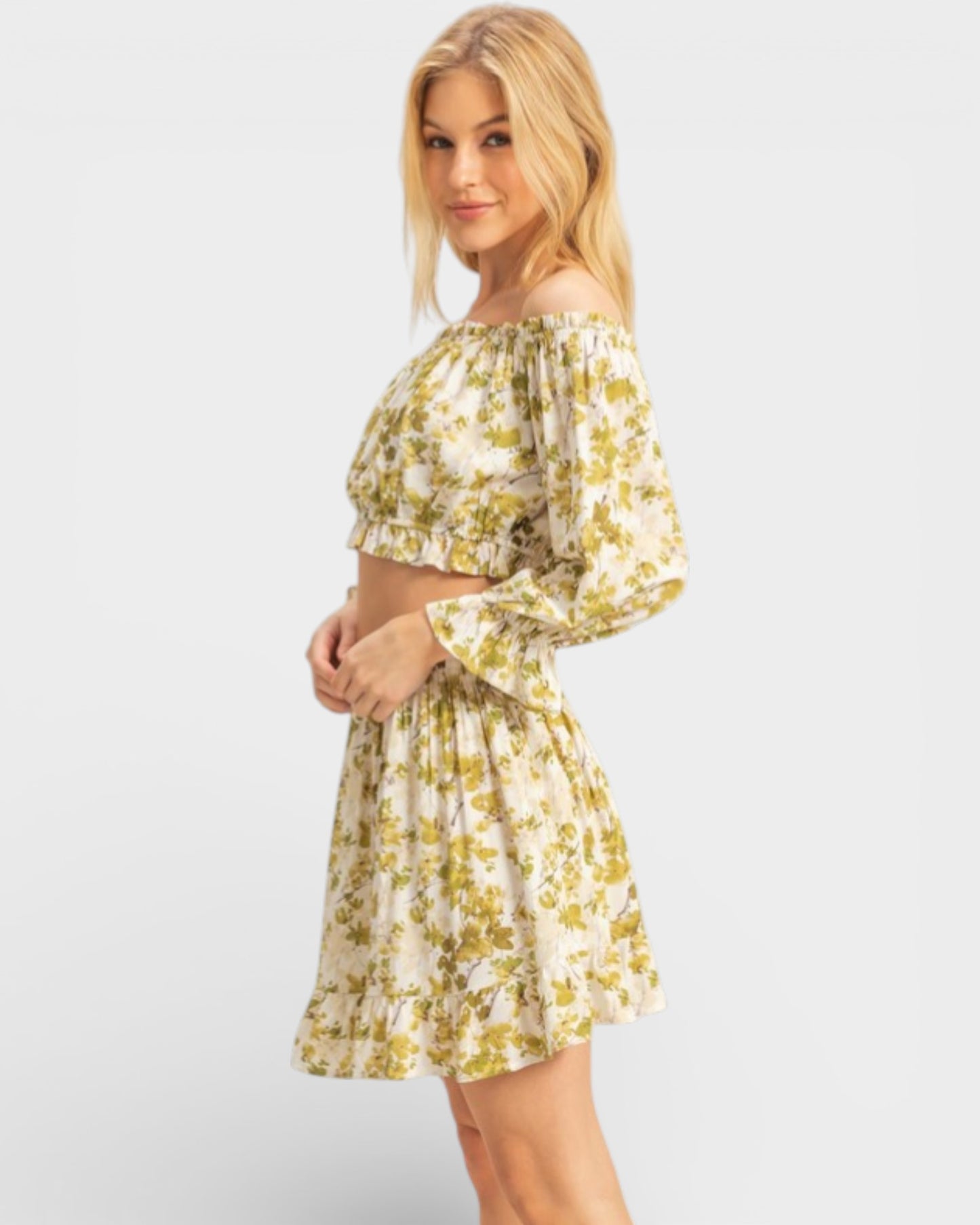 Woman wearing a floral dress on a white background