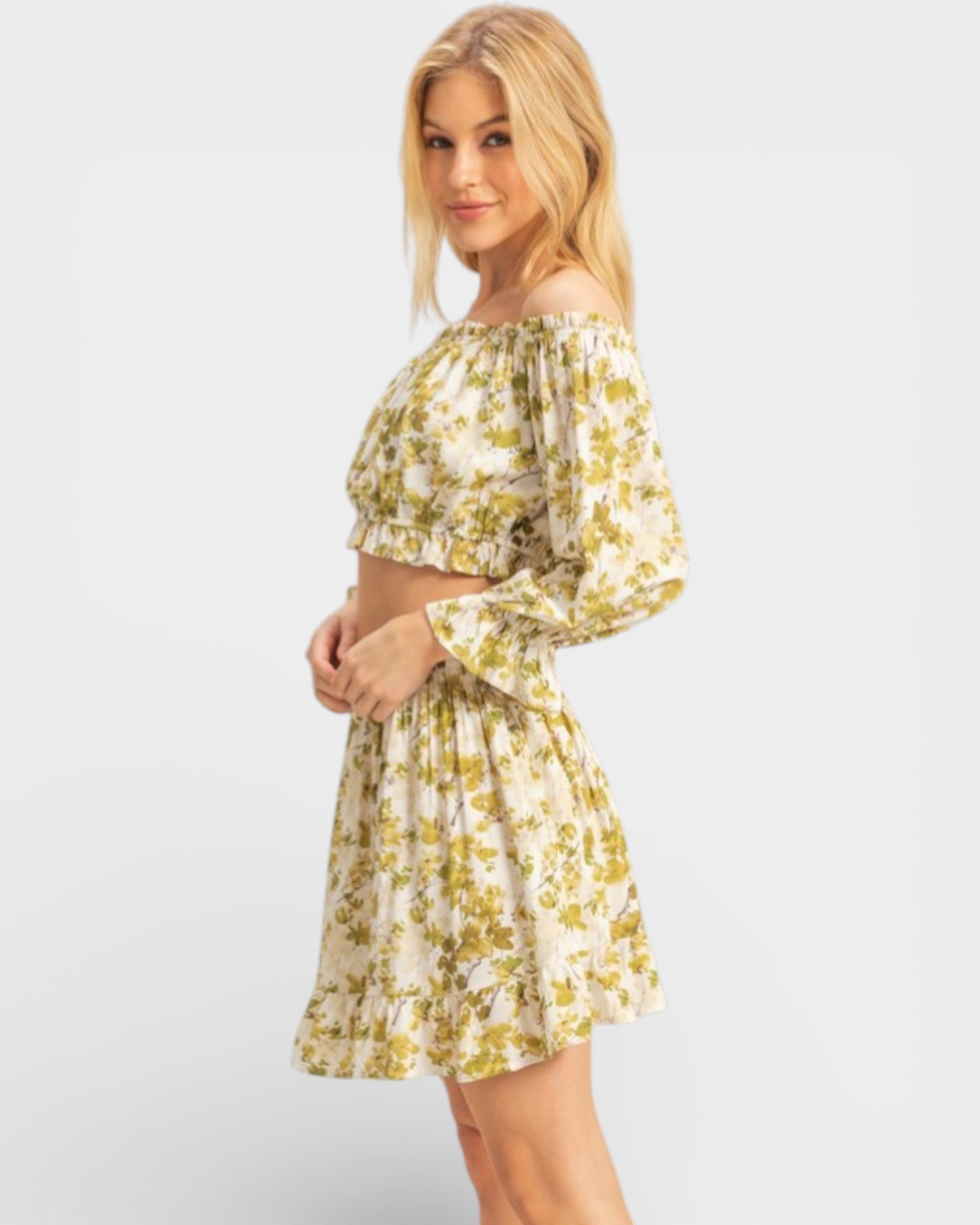 Woman wearing a floral dress on a white background