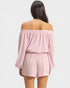 Pink off-shoulder top and shorts set on a white background