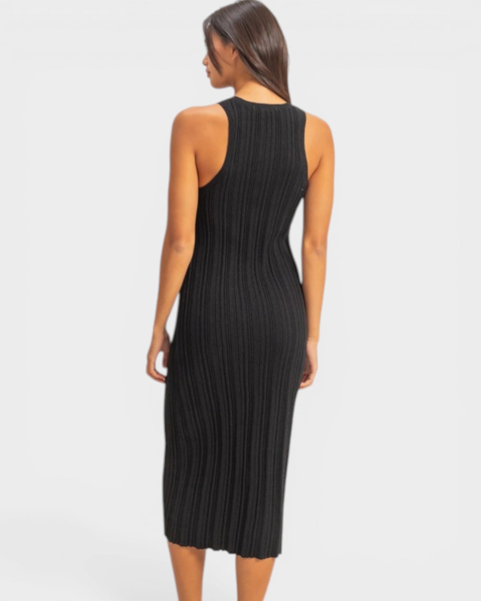 Black ribbed dress worn by a model on a white background