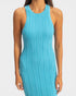 Person wearing a blue ribbed dress on a white background