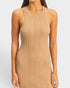Beige ribbed dress worn by a model on a white background