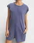 Blue sleeveless dress worn by a person on a white background
