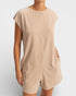 Beige dress worn by a person on a white background