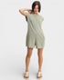 Woman wearing a green dress on a white background
