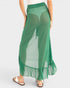 Green sheer skirt with ruffled hem on a white background