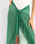 Green fringed skirt with a white background
