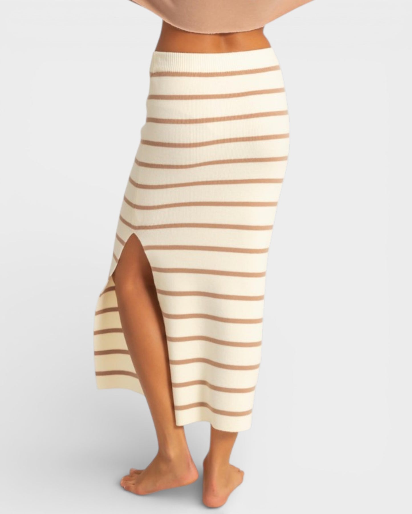 Striped skirt with a side slit on a plain background