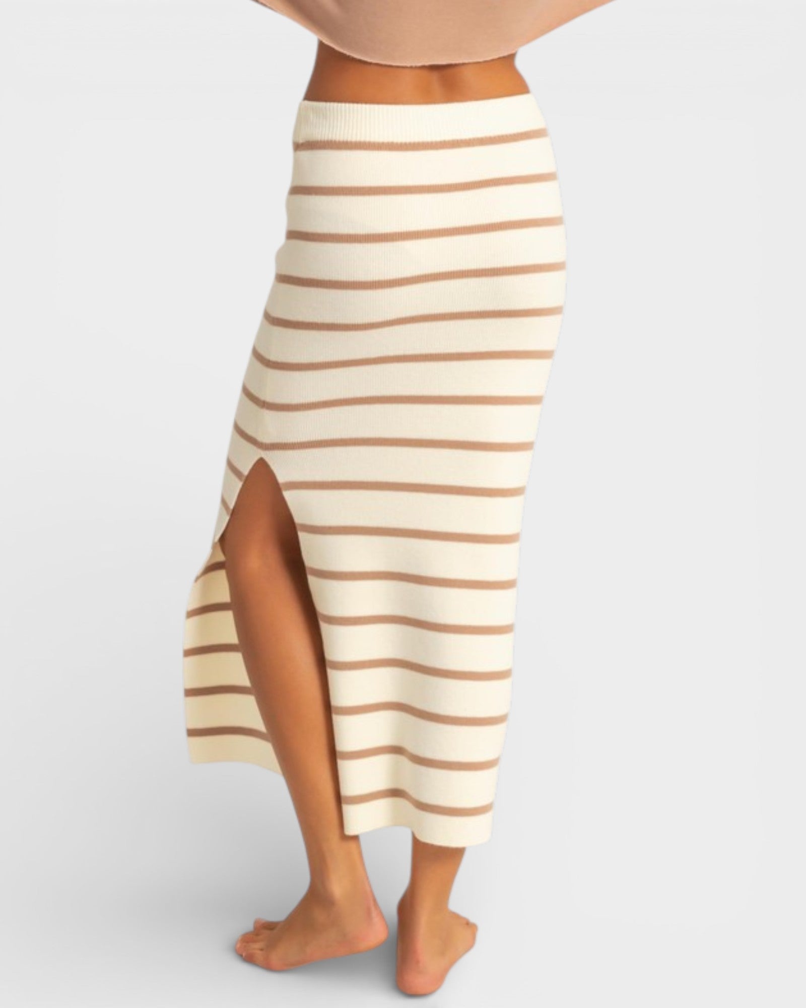 Striped skirt with a side slit on a plain background